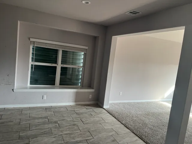 an empty room with a window