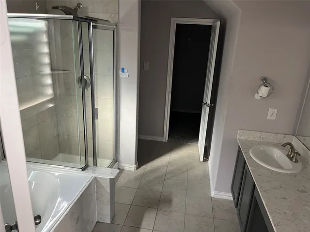 a bathroom with a sink and a tub