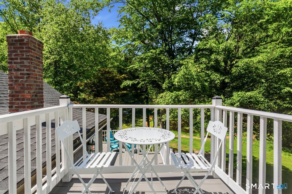 188 Bacon Road Roxbury, CT 06783 - Photo 18 of 33 a view of a chair and table in the balcony