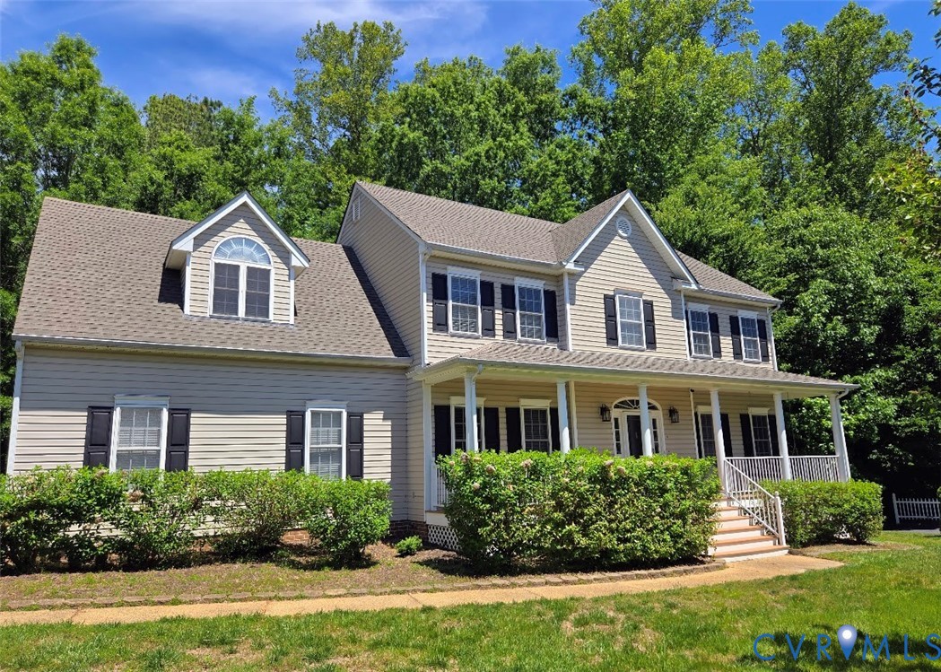 16406 Benmore Road Moseley, VA 23120 - Photo 2 of 32 a front view of a house with yard and green space