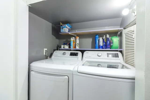 a utility room with dryer and washer