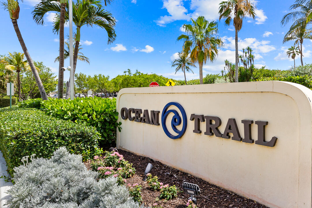 400 Ocean Trail Way, Unit 1108 Jupiter, FL 33477 - Photo 2 of 41 a view of a sign board with a small yard