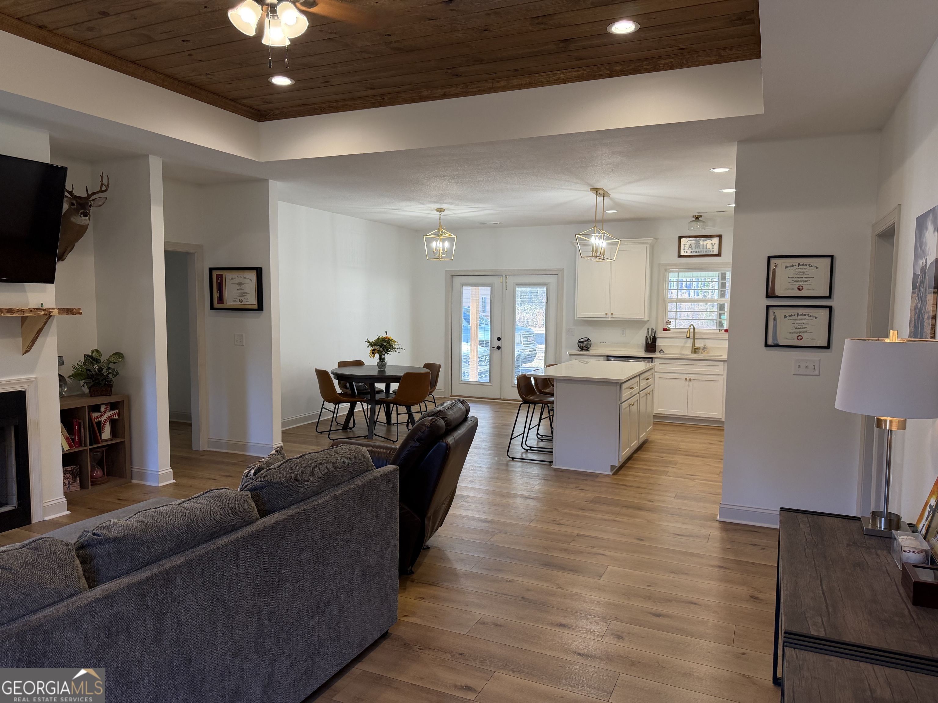 1347 Payne Road Rentz, GA 31075 - Photo 14 of 45 a living room with furniture and a flat screen tv