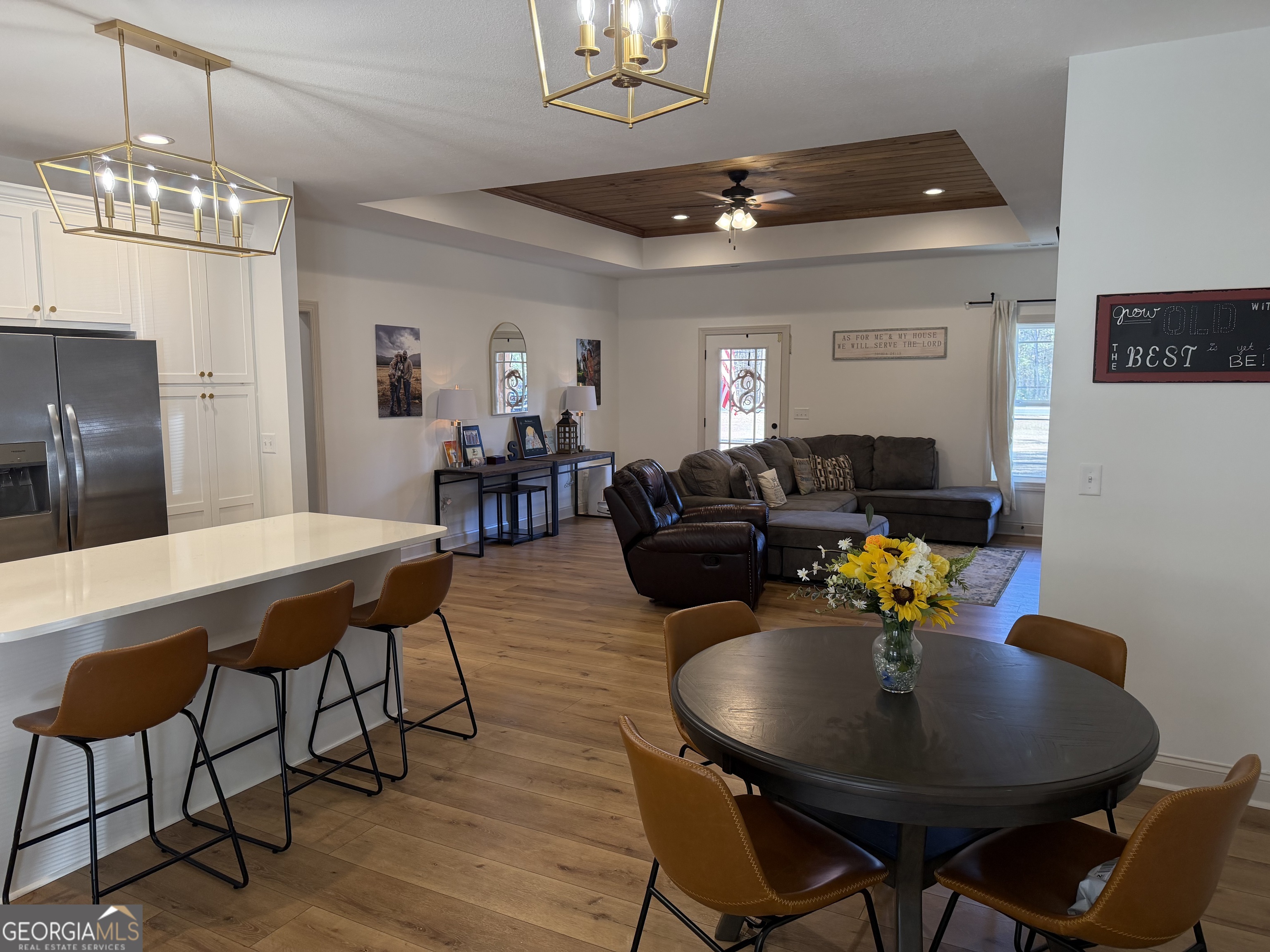 1347 Payne Road Rentz, GA 31075 - Photo 19 of 45 a view of a dining room with furniture and chandelier
