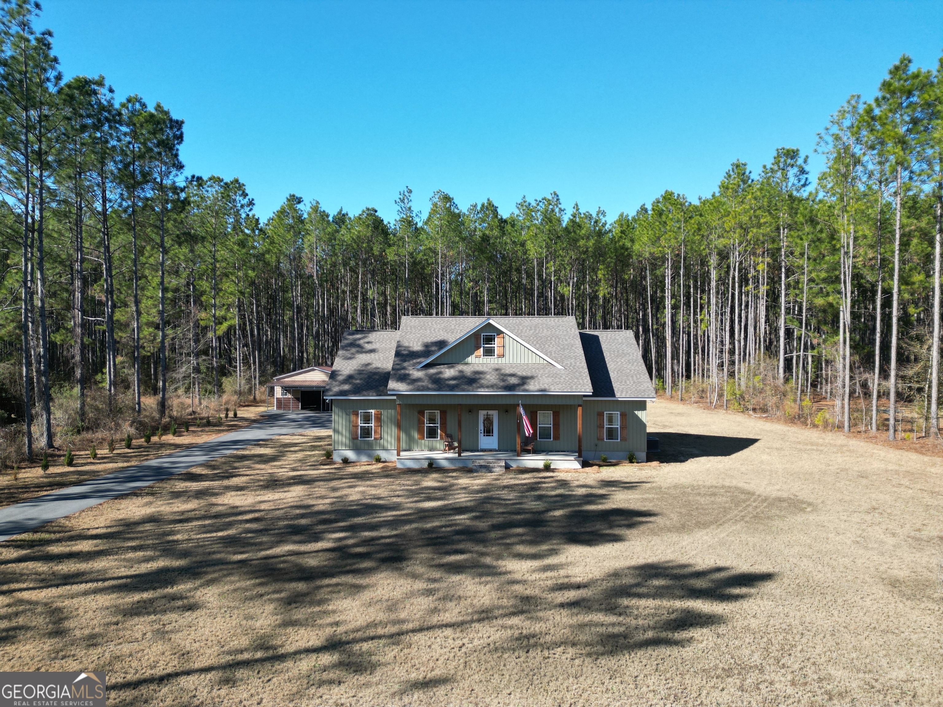 1347 Payne Road Rentz, GA 31075 - Photo 2 of 45 a view of a house with pool and sitting area