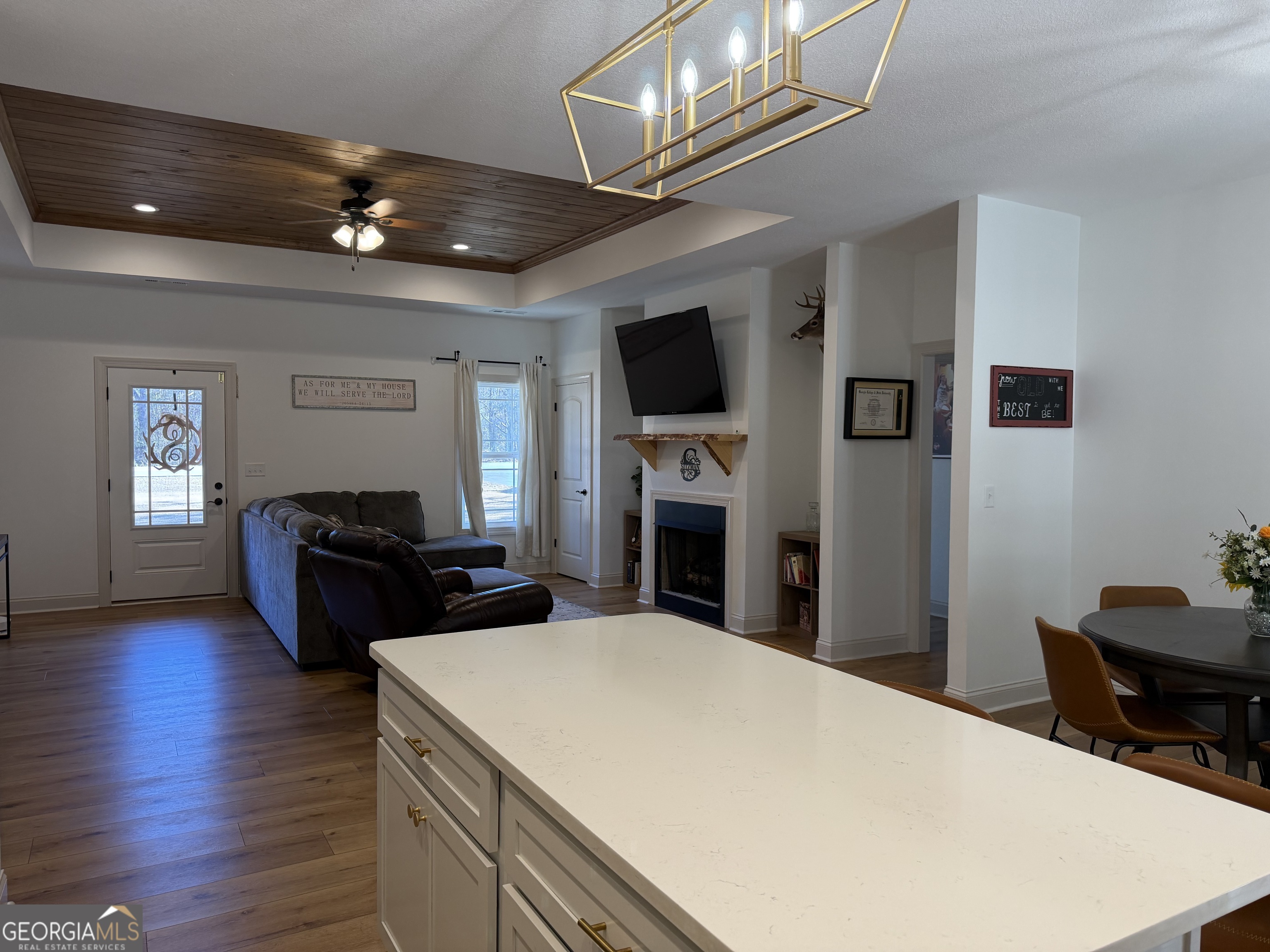 1347 Payne Road Rentz, GA 31075 - Photo 22 of 45 a bed room with furniture and a flat screen tv