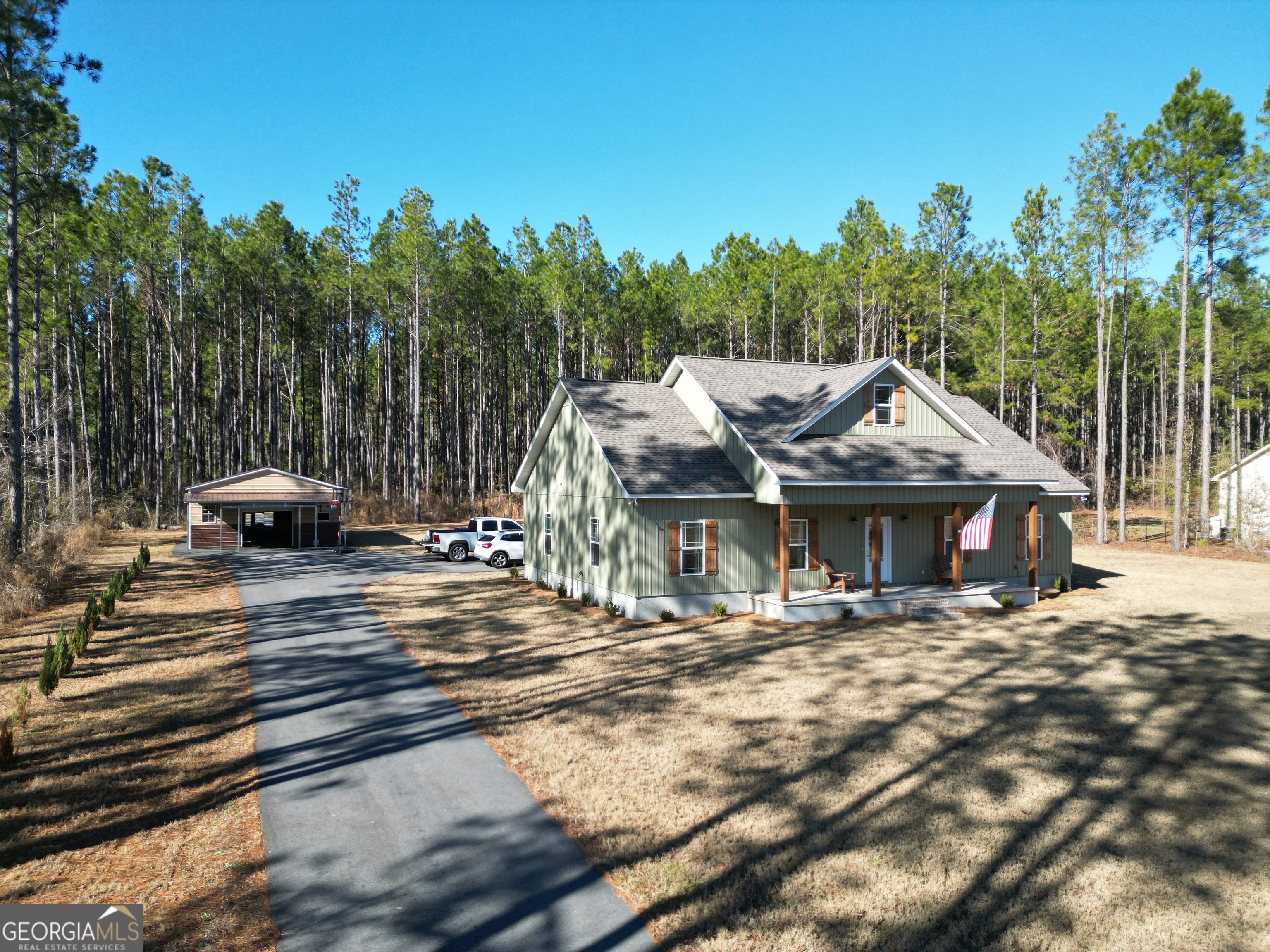 1347 Payne Road Rentz, GA 31075 - Photo 3 of 45 a view of a house with a cars park