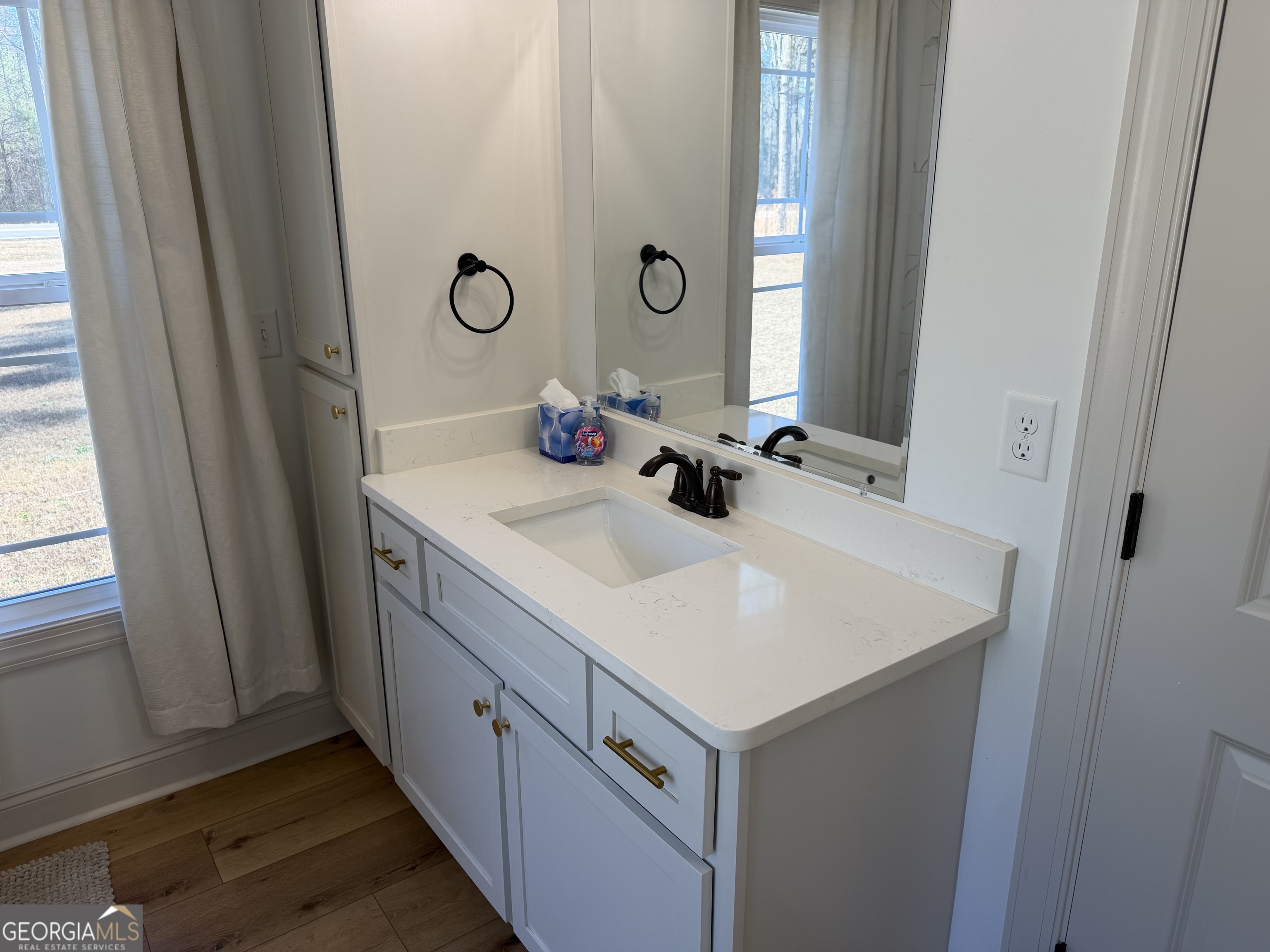 1347 Payne Road Rentz, GA 31075 - Photo 32 of 45 a bathroom with a sink and a mirror