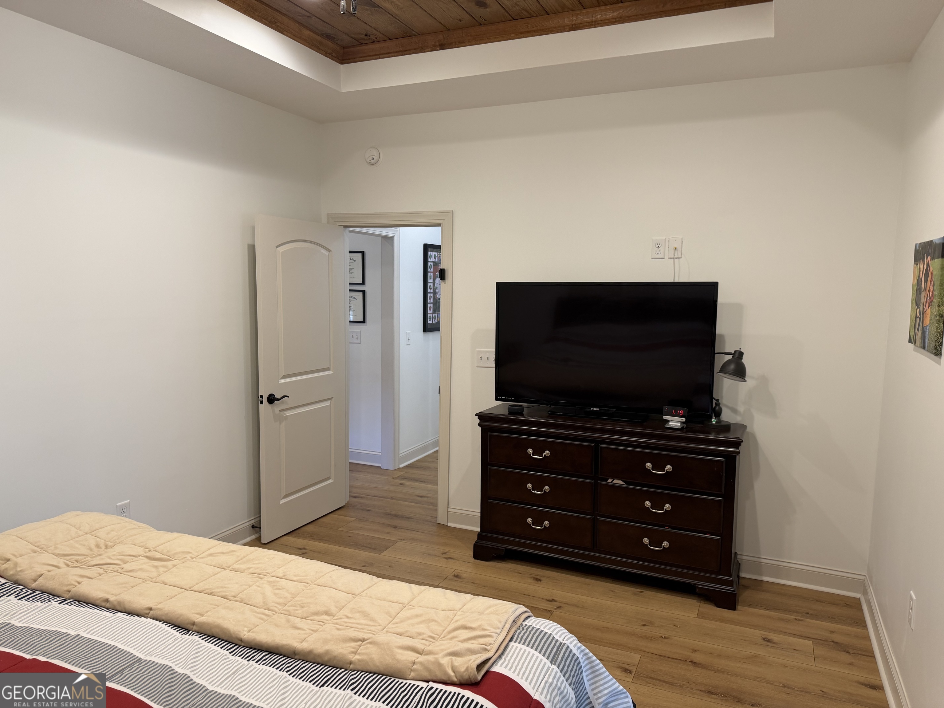 1347 Payne Road Rentz, GA 31075 - Photo 34 of 45 a bedroom with a bed and a flat screen tv