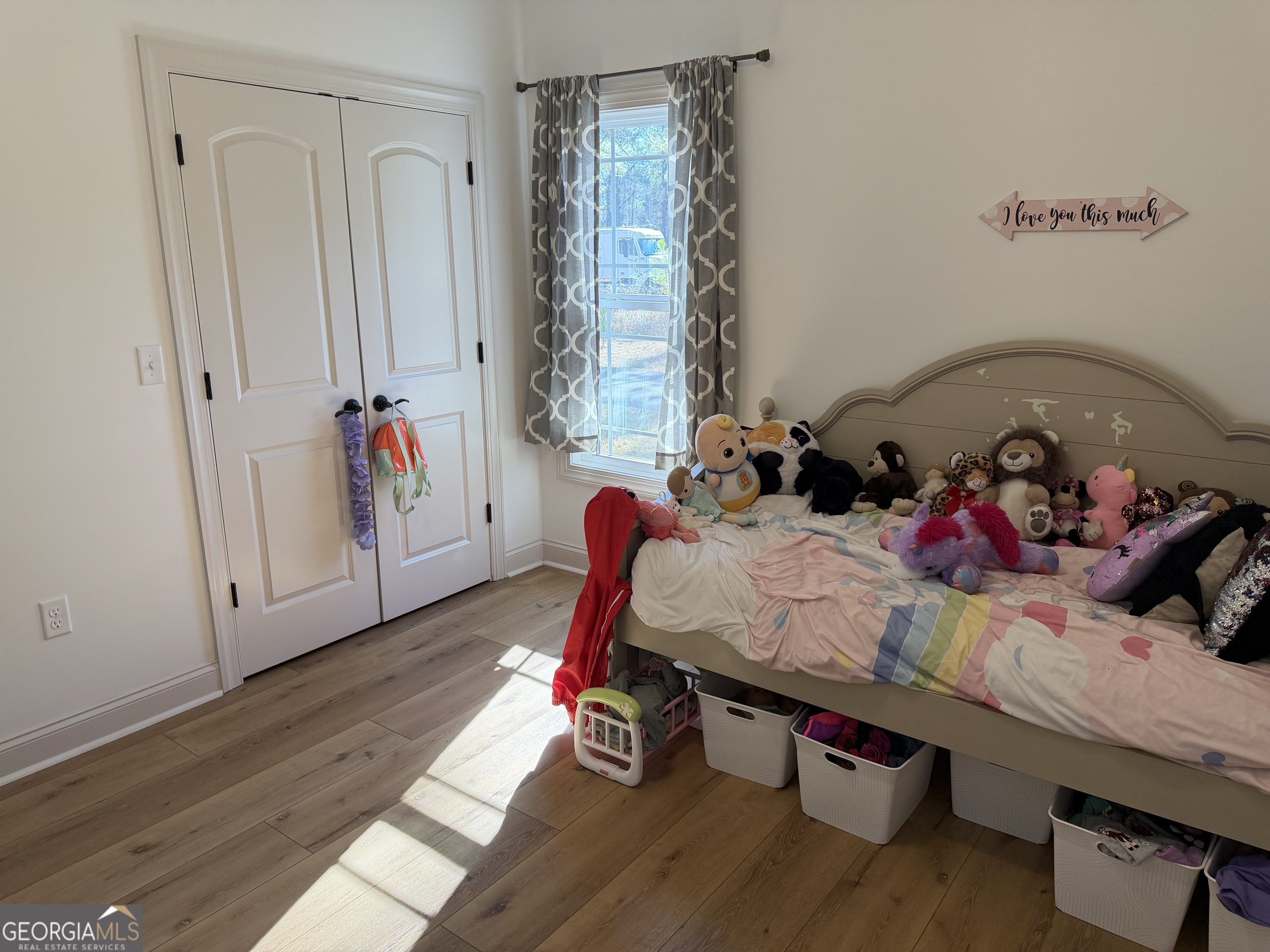 1347 Payne Road Rentz, GA 31075 - Photo 40 of 45 a bed room with a bed and a couch