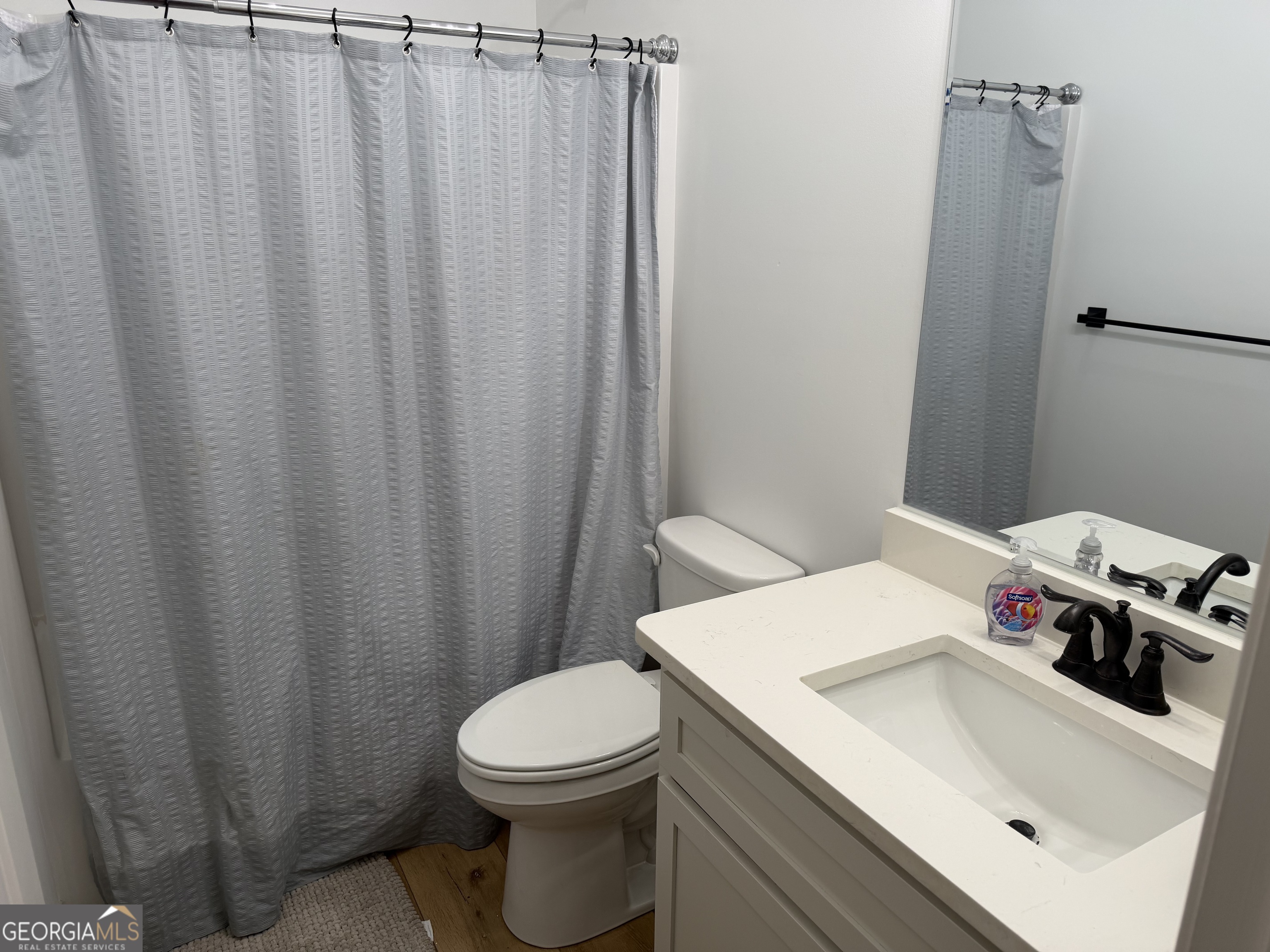 1347 Payne Road Rentz, GA 31075 - Photo 41 of 45 a bathroom with a sink and toilet