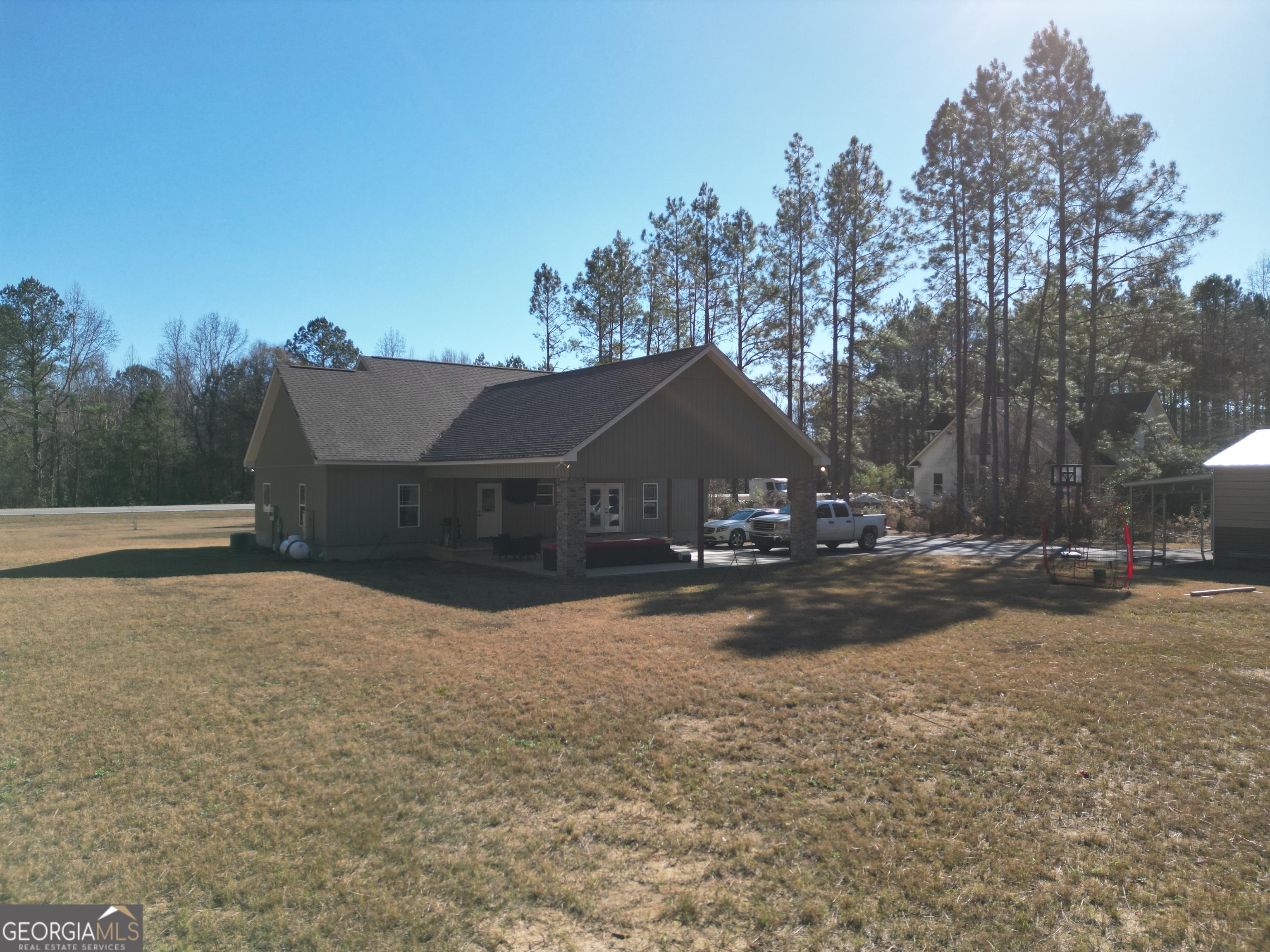 1347 Payne Road Rentz, GA 31075 - Photo 5 of 45 a view of a house with a yard