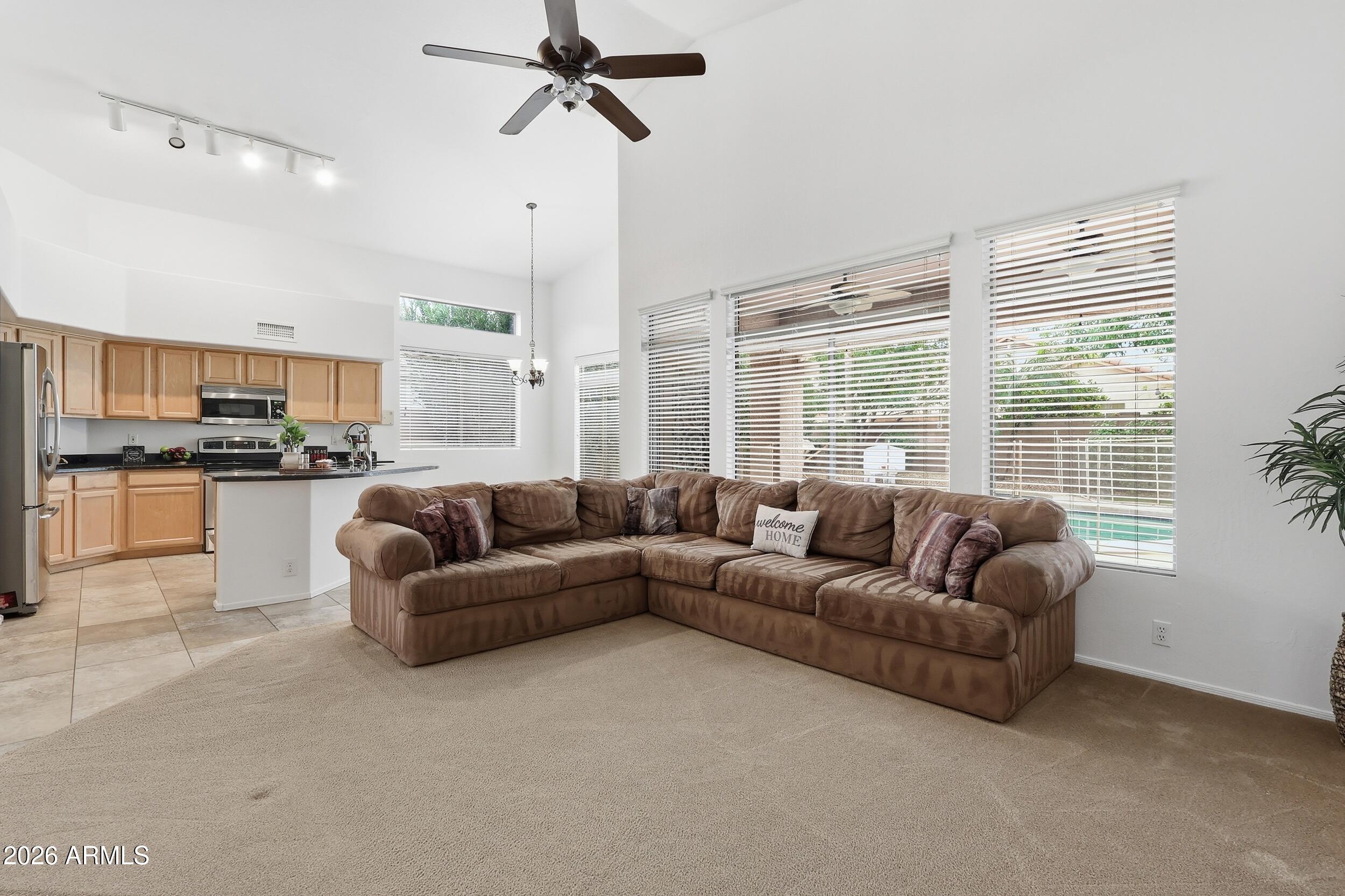 5377 West Jupiter Way Chandler, AZ 85226 - Photo 15 of 49 a living room with furniture and a large window