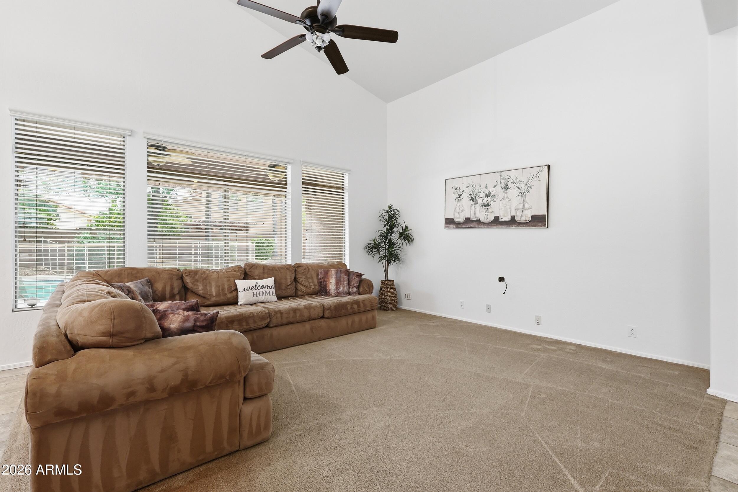 5377 West Jupiter Way Chandler, AZ 85226 - Photo 17 of 49 a living room with furniture and a window