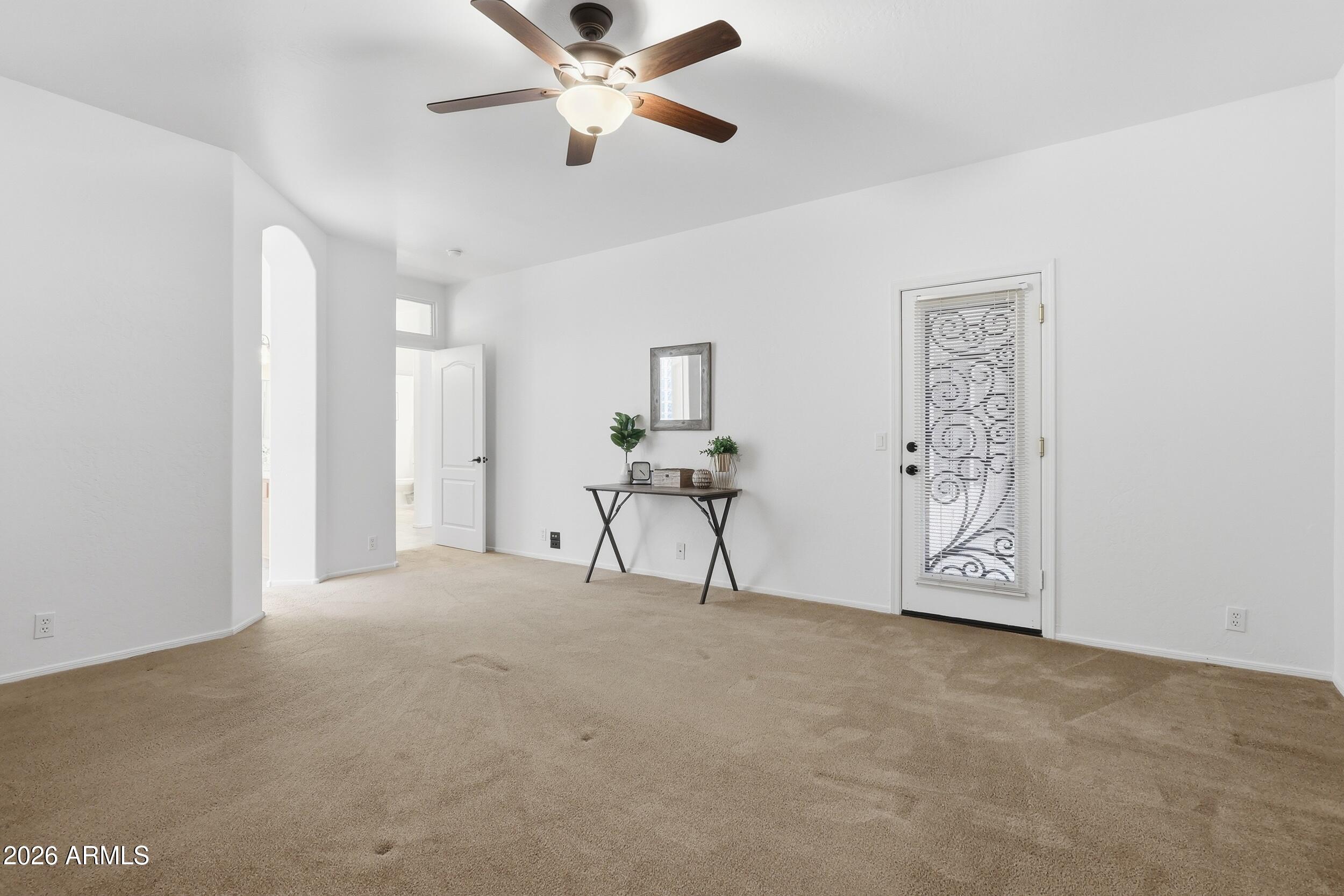 5377 West Jupiter Way Chandler, AZ 85226 - Photo 20 of 49 a view of an empty room and chandelier fan