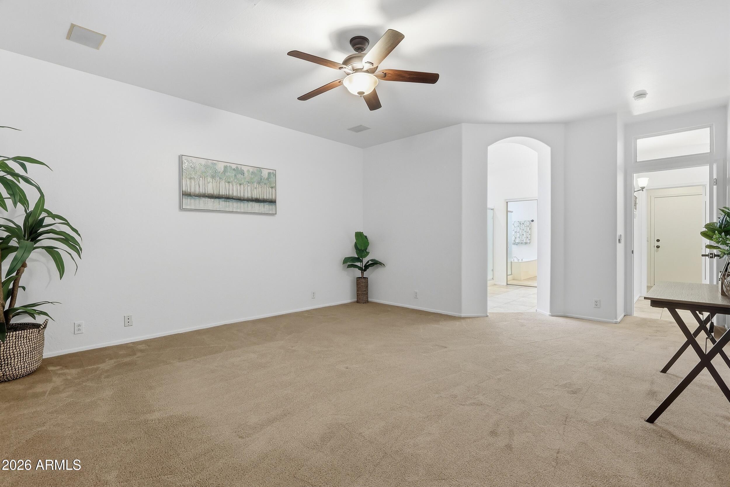 5377 West Jupiter Way Chandler, AZ 85226 - Photo 21 of 49 an empty room with closet and a chandelier fan