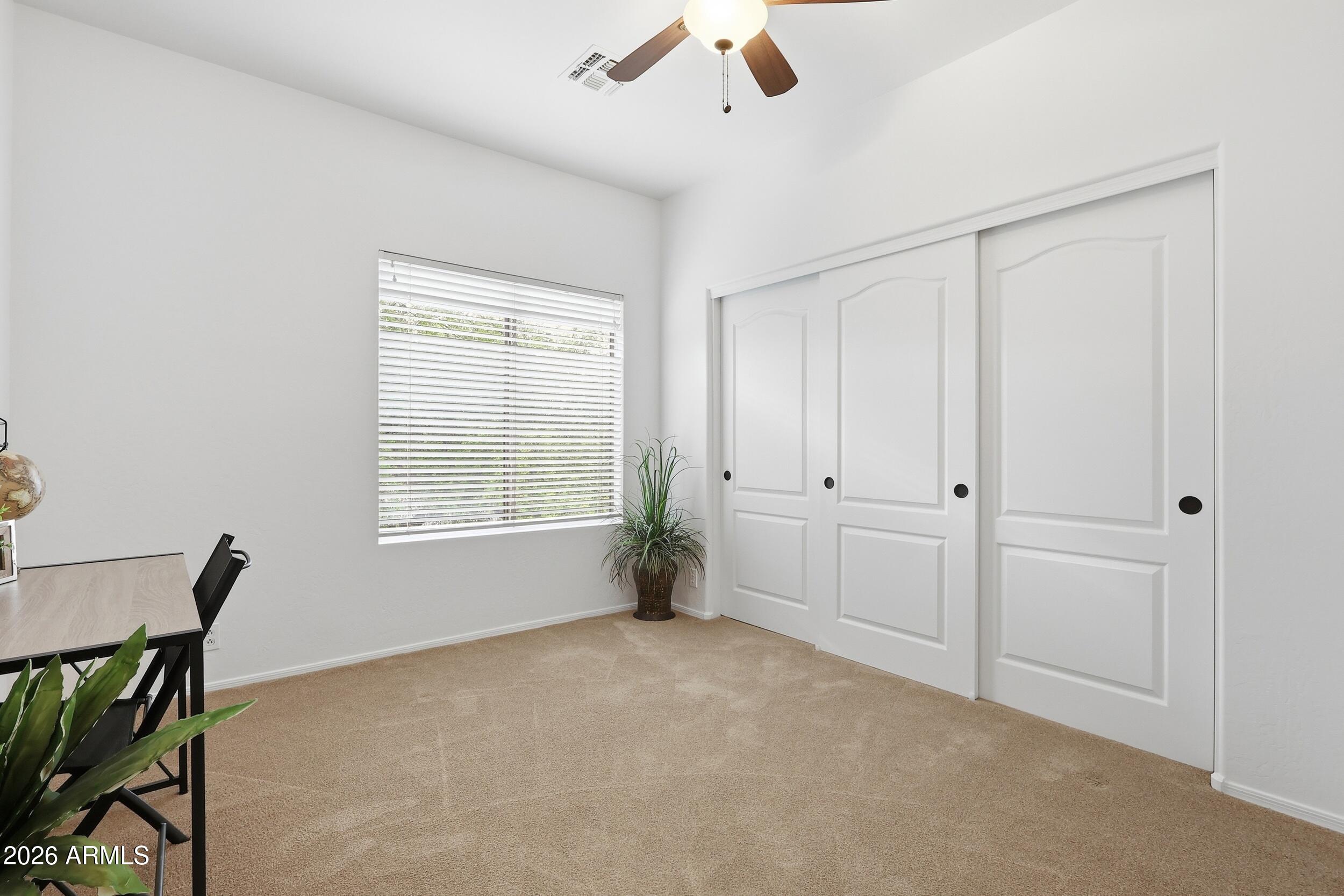 5377 West Jupiter Way Chandler, AZ 85226 - Photo 30 of 49 a view of an empty room with a window