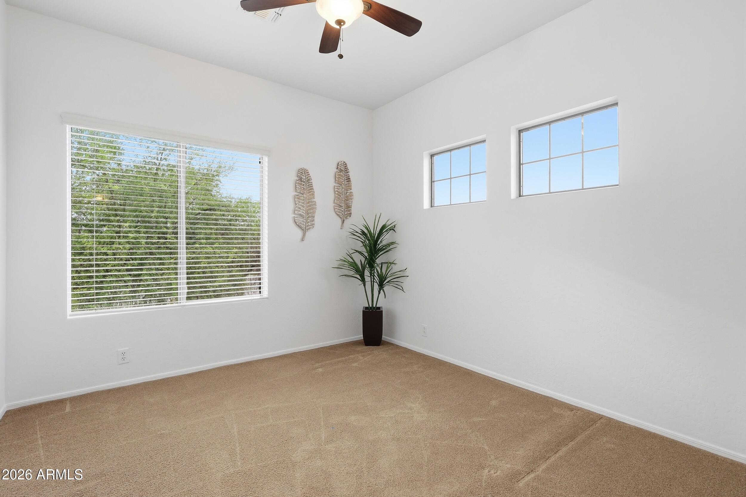 5377 West Jupiter Way Chandler, AZ 85226 - Photo 31 of 49 a view of an empty room with a window