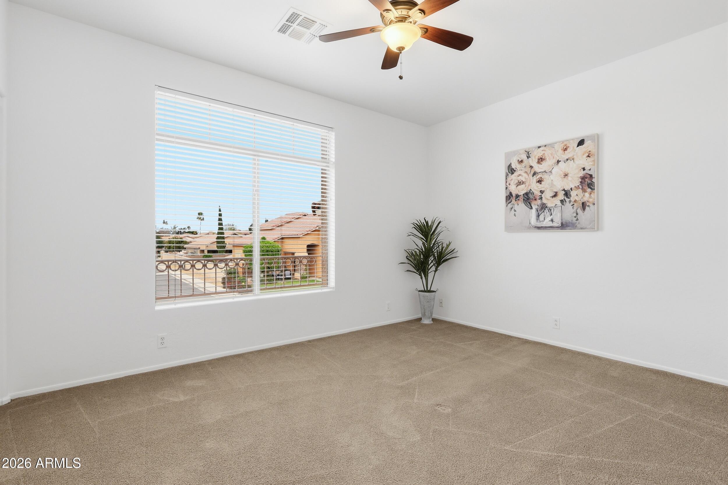 5377 West Jupiter Way Chandler, AZ 85226 - Photo 33 of 49 a view of an empty room with a window