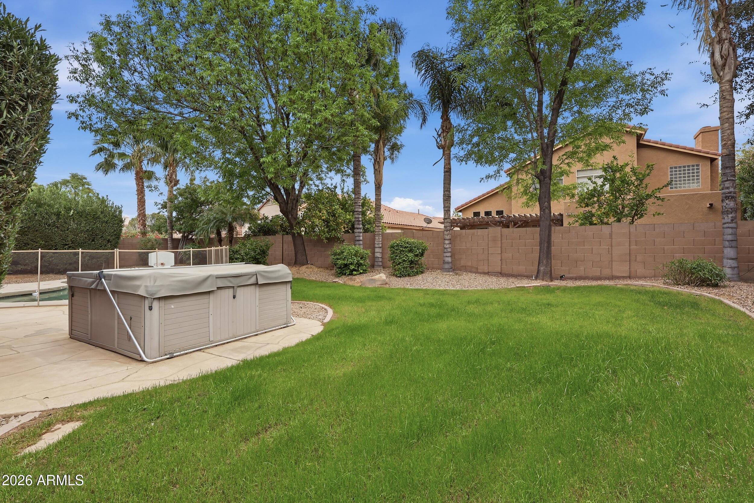 5377 West Jupiter Way Chandler, AZ 85226 - Photo 38 of 49 a view of a couches in a backyard