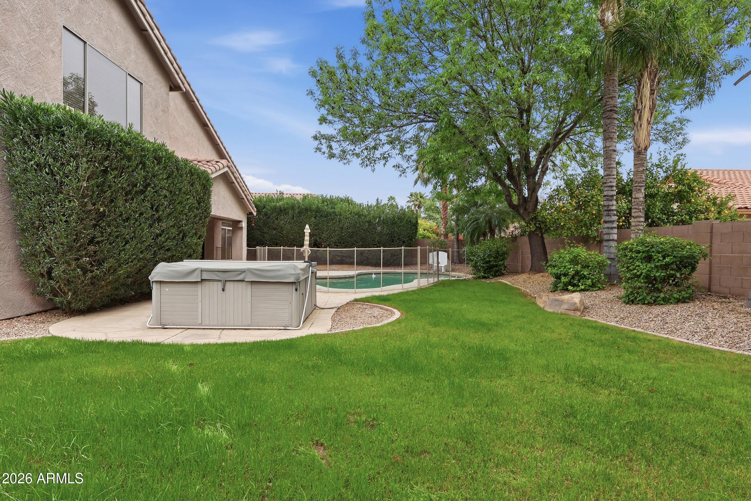 5377 West Jupiter Way Chandler, AZ 85226 - Photo 40 of 49 a view of a garden with swimming pool