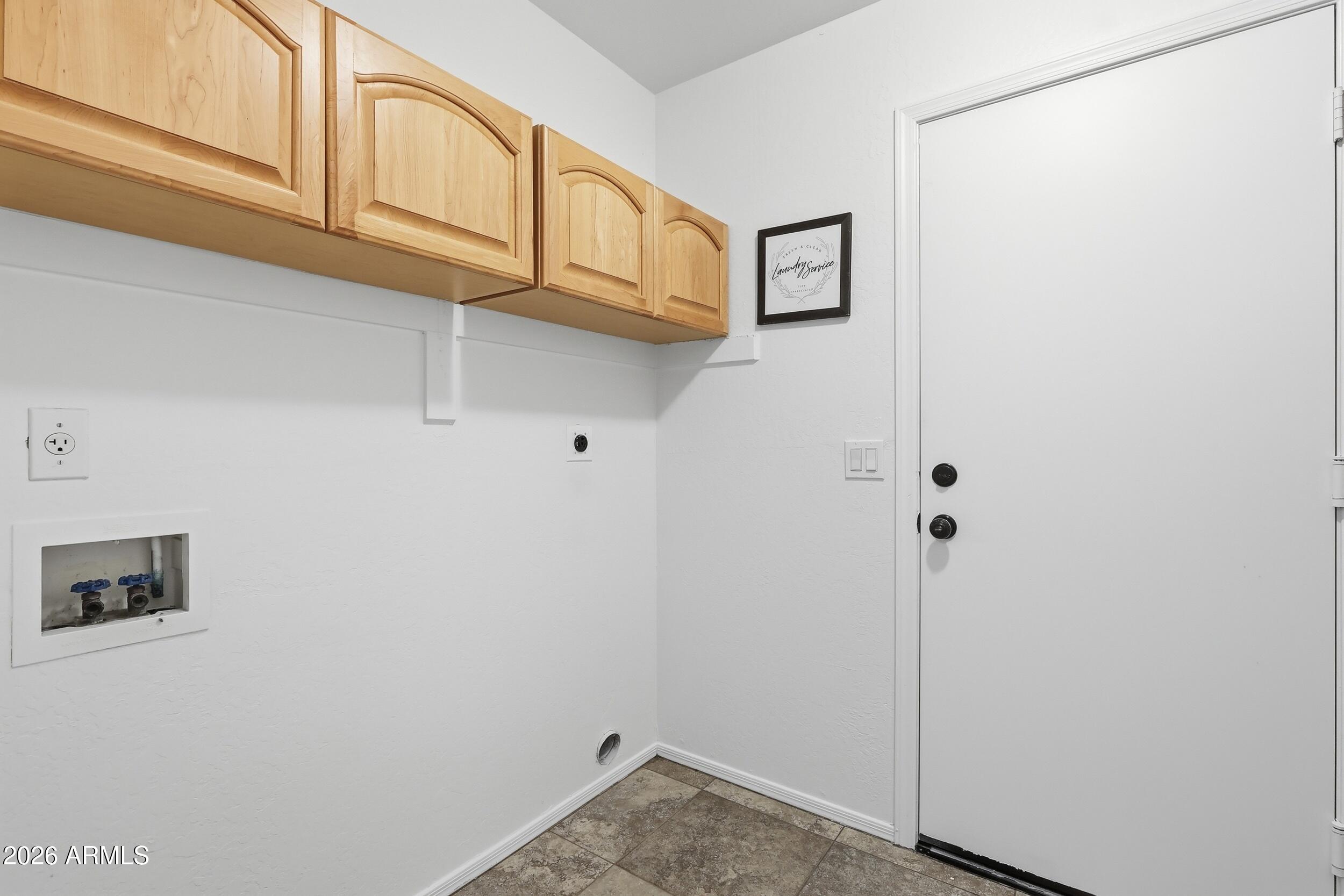 5377 West Jupiter Way Chandler, AZ 85226 - Photo 42 of 49 a view of a storage and utility room with cabinets