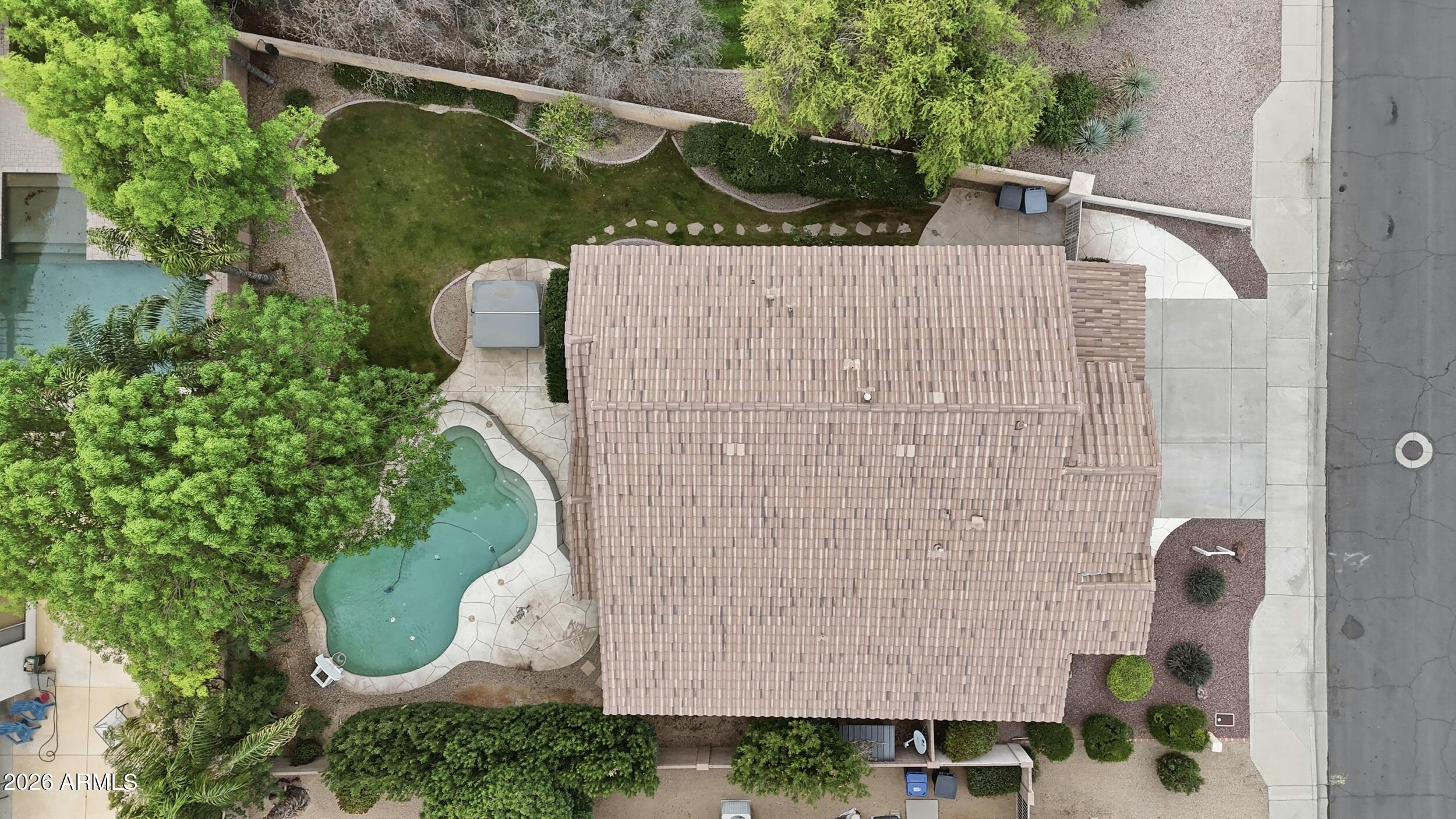 5377 West Jupiter Way Chandler, AZ 85226 - Photo 45 of 49 an aerial view of a house with a yard and large trees