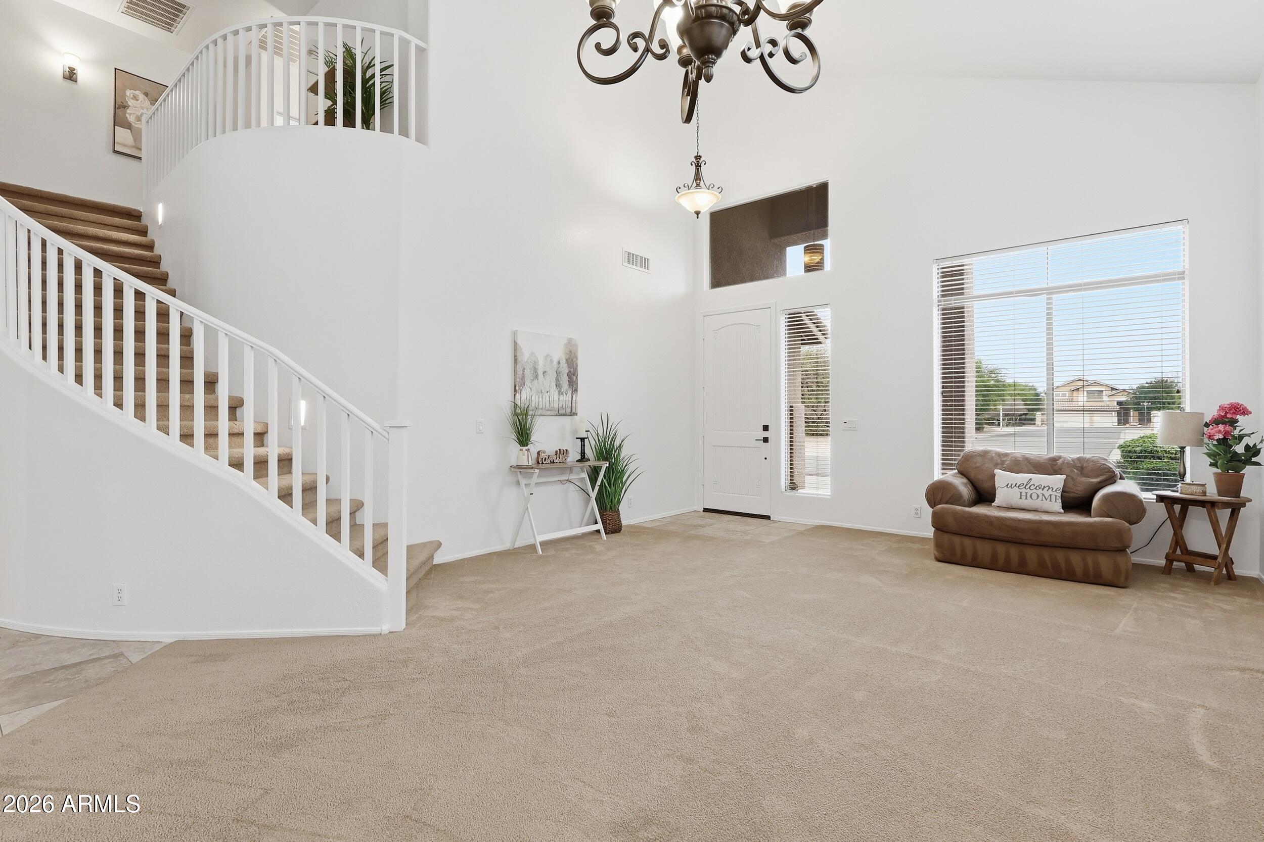 5377 West Jupiter Way Chandler, AZ 85226 - Photo 6 of 49 a view of livingroom with furniture and windows