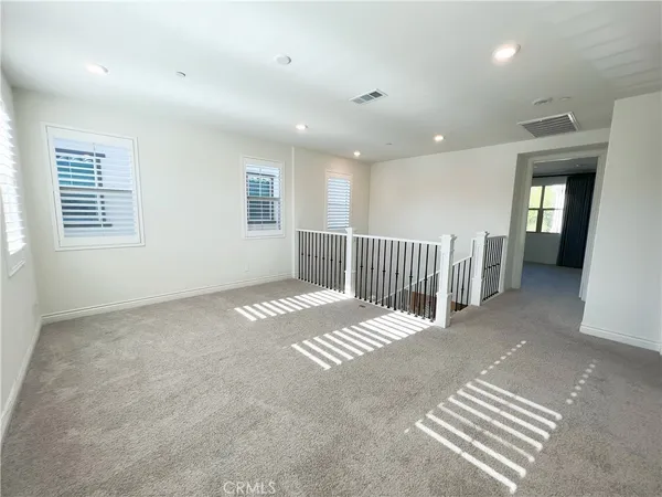 a view of a livingroom with a balcony