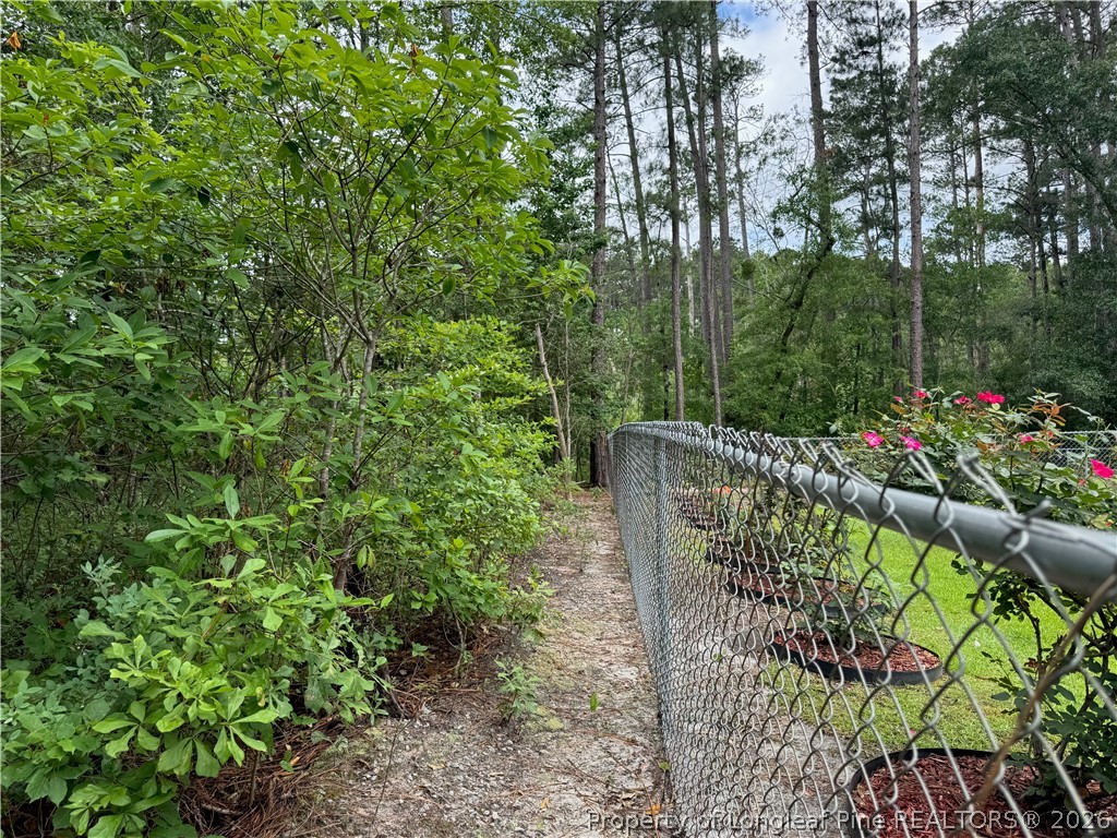 Tbd Myra Road Raeford, NC 28376 - Photo 20 of 23 Property line border with neighbor's fence