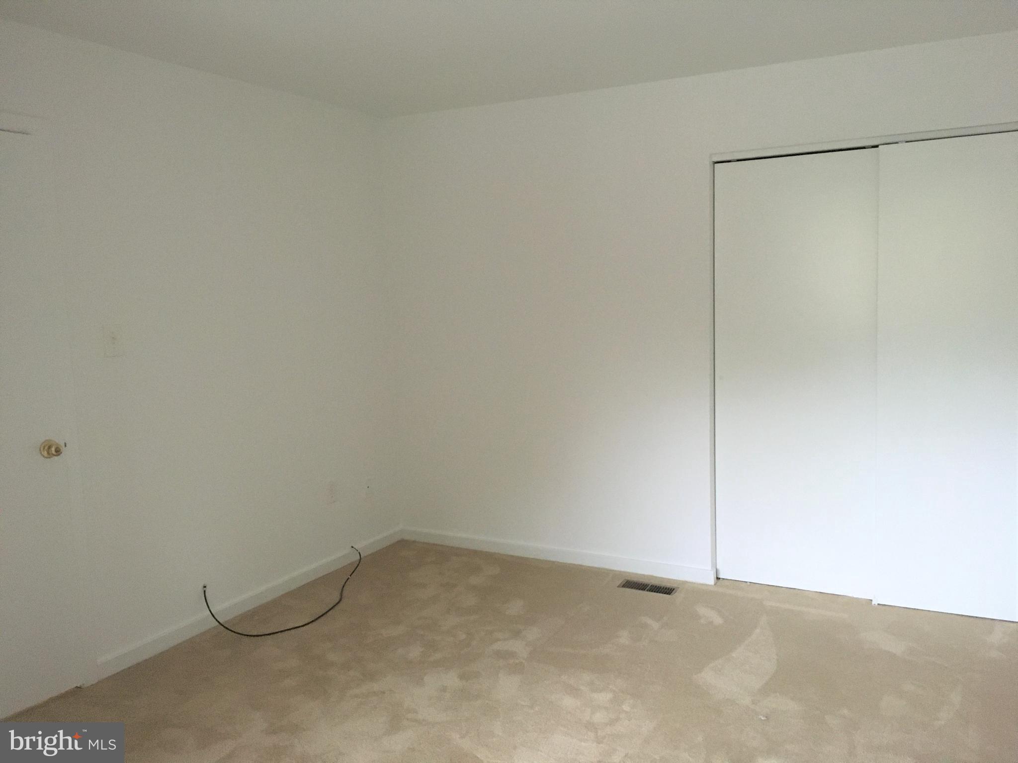 10343 Tailcoat Way Columbia, MD 21044 - Photo 11 of 21 a view of an empty room