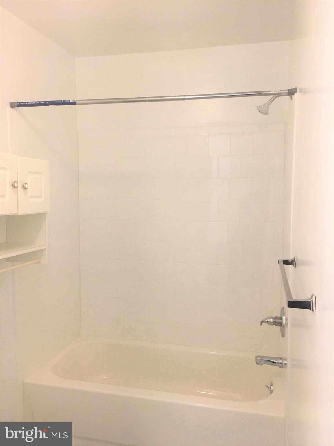 10343 Tailcoat Way Columbia, MD 21044 - Photo 13 of 21 a bathroom with a shower