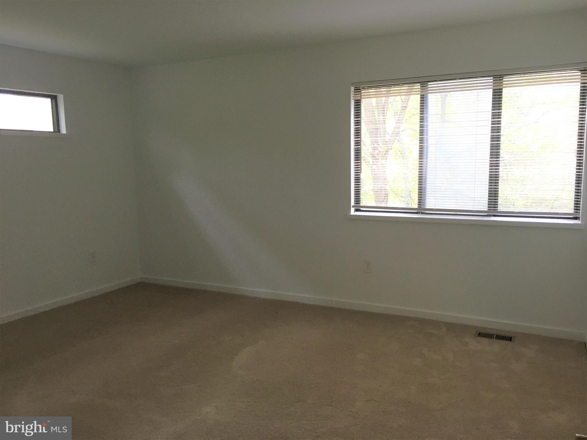 10343 Tailcoat Way Columbia, MD 21044 - Photo 14 of 21 an empty room with a window