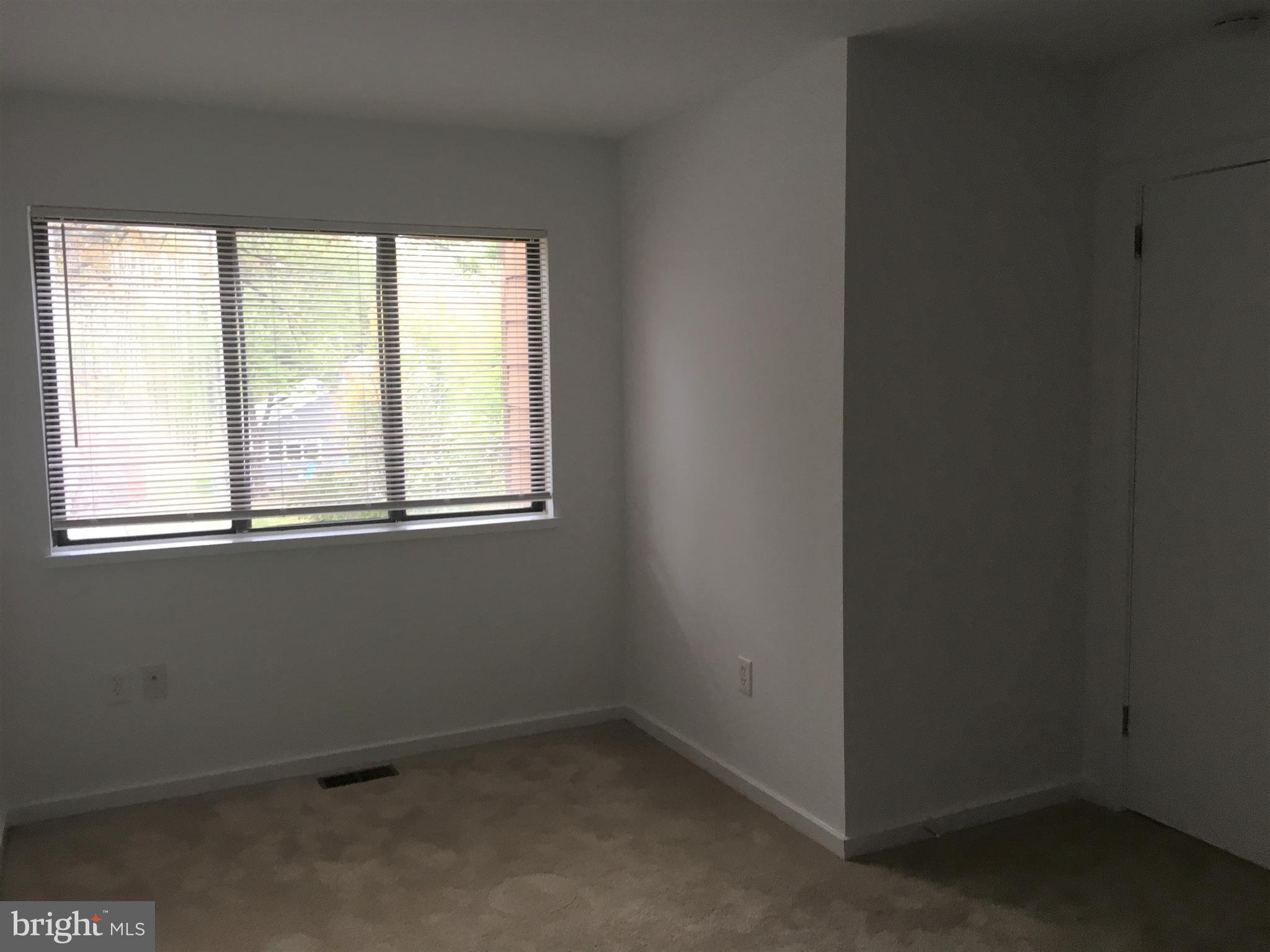 10343 Tailcoat Way Columbia, MD 21044 - Photo 15 of 21 an empty room with a window
