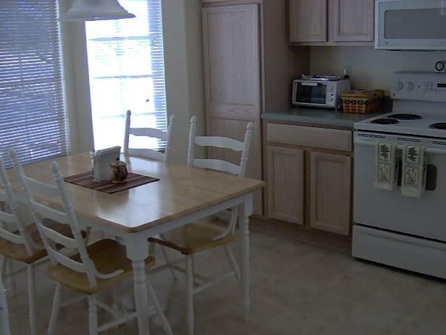 1720 Camino Jacinto Rio Rico, AZ 85648 - Photo 8 of 9 a kitchen with a sink cabinets and window