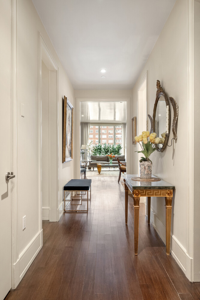 255 East 74th Street, Unit 6B Manhattan, NY 10021 - Photo 2 of 10 a living room with furniture and a wooden floor