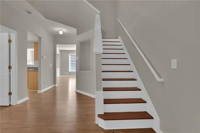 a view of entryway with wooden floor
