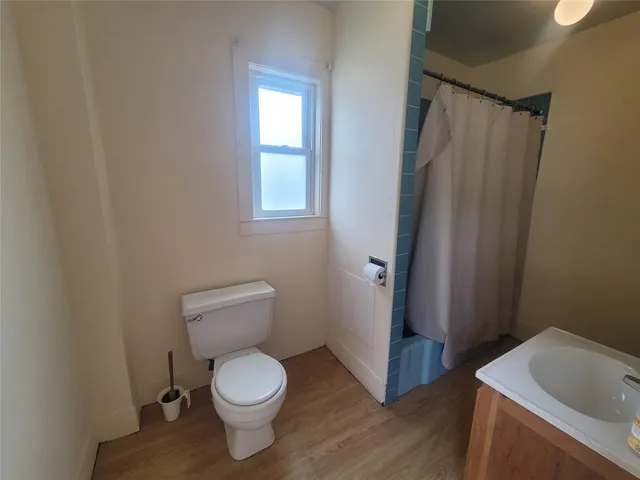 a bathroom with a toilet and a sink