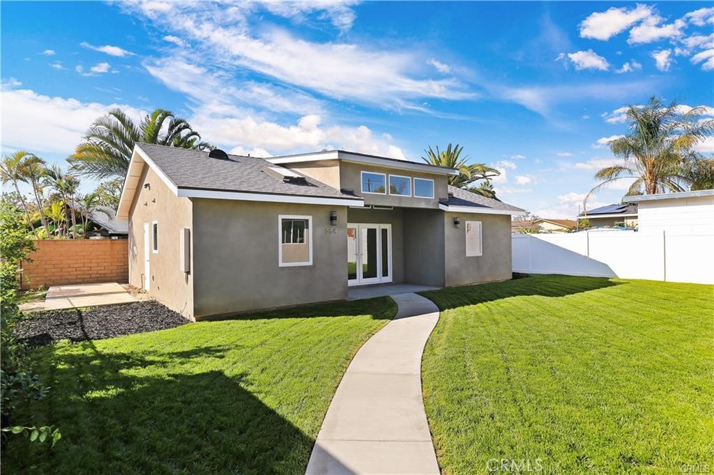 552 North Cambridge Street Orange, CA 92867 - Photo 18 of 18 a front view of a house with garden
