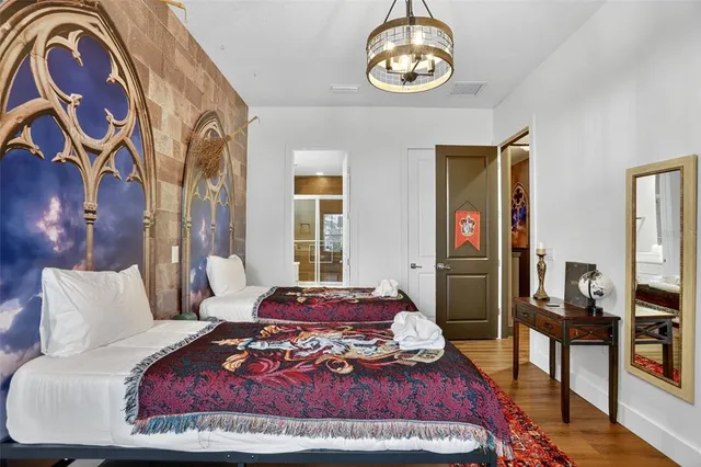 a bedroom with a bed and dresser