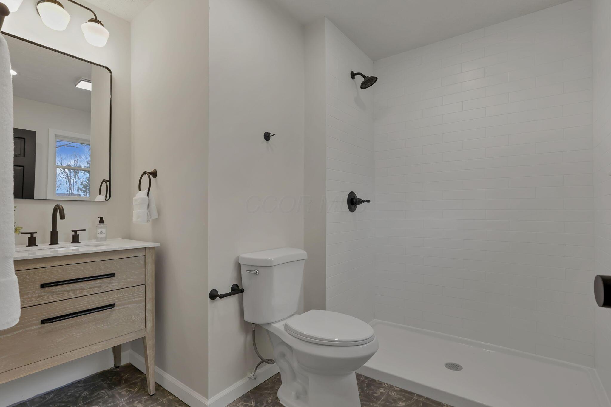 5289 Hazelton-Etna Road Southwest Pataskala, OH 43062 - Photo 26 of 67 Primary bathroom - new everything!