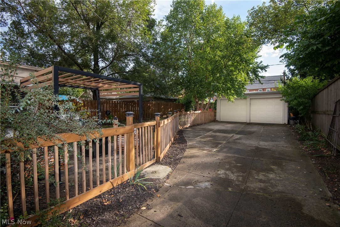 2583 Channing Road Cleveland, OH 44118 - Photo 2 of 21 Solar lights top the wood fencing