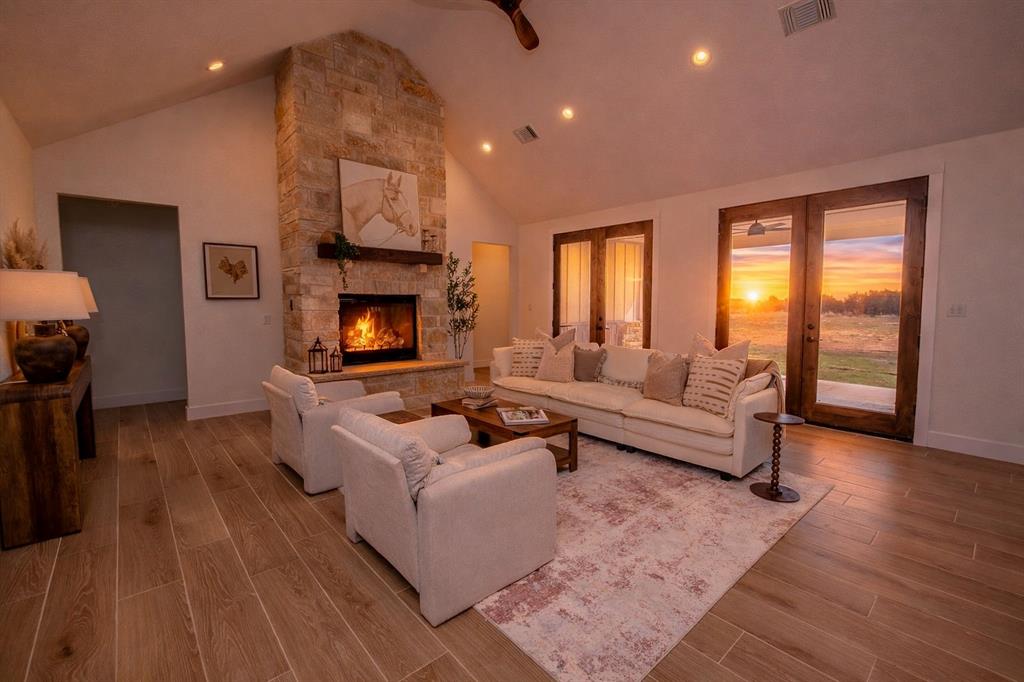 2847 Canyon Wren Loop Graford, TX 76449 - Photo 11 of 40 a living room with furniture and a fireplace