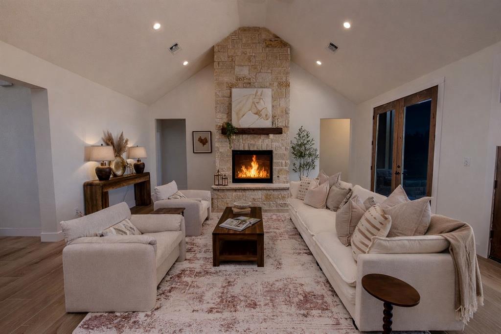 2847 Canyon Wren Loop Graford, TX 76449 - Photo 12 of 40 a living room with furniture and a fireplace