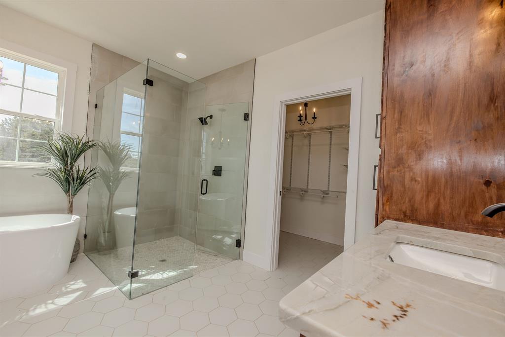 2847 Canyon Wren Loop Graford, TX 76449 - Photo 25 of 40 a bathroom with a shower and a toilet