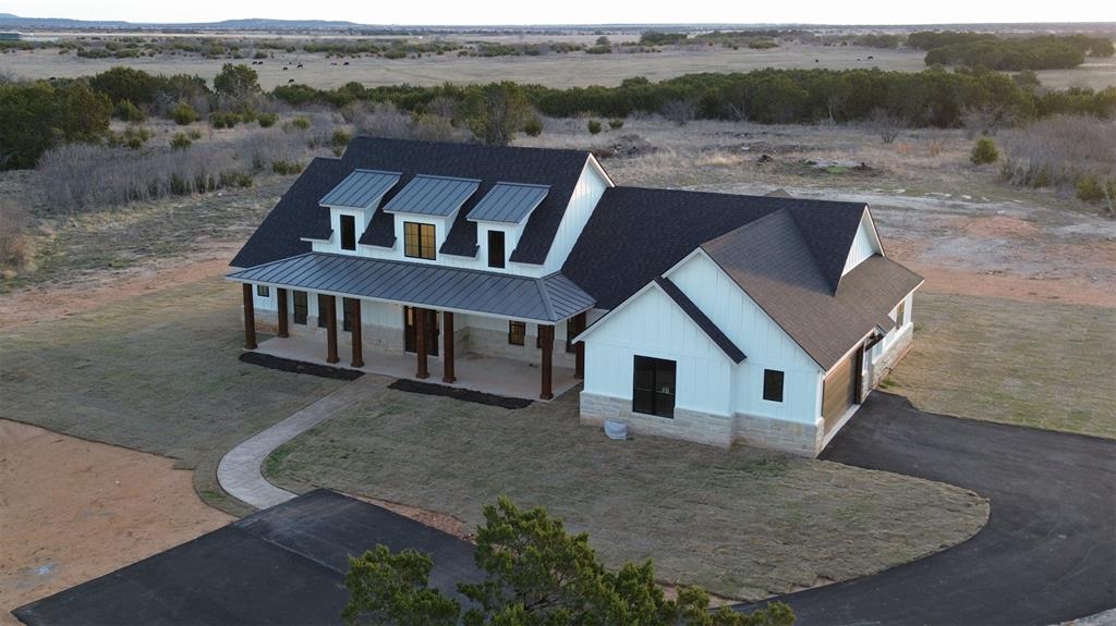 2847 Canyon Wren Loop Graford, TX 76449 - Photo 39 of 40 an aerial view of house with yard