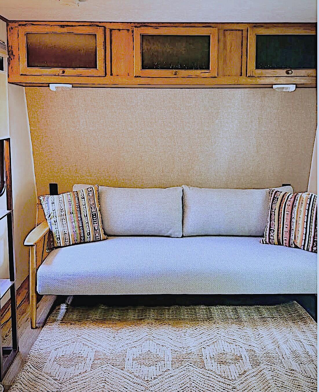71 South Highland Road, Unit 1 Truro, MA 02666 - Photo 10 of 51 a living room with a couch and kitchen view