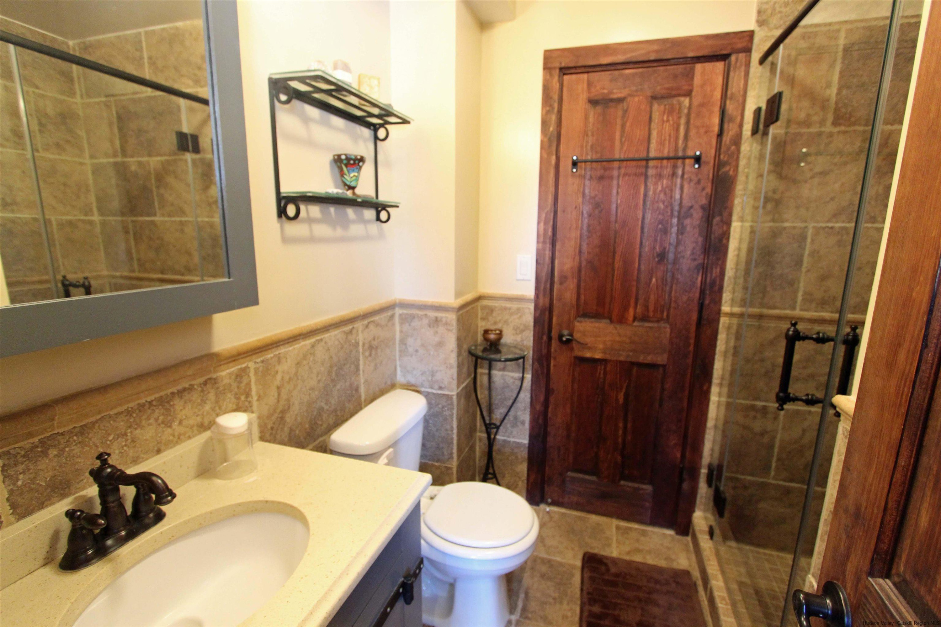 143 Rossman Road Roxbury, NY 12421 - Photo 24 of 35 a bathroom with a sink and toilet