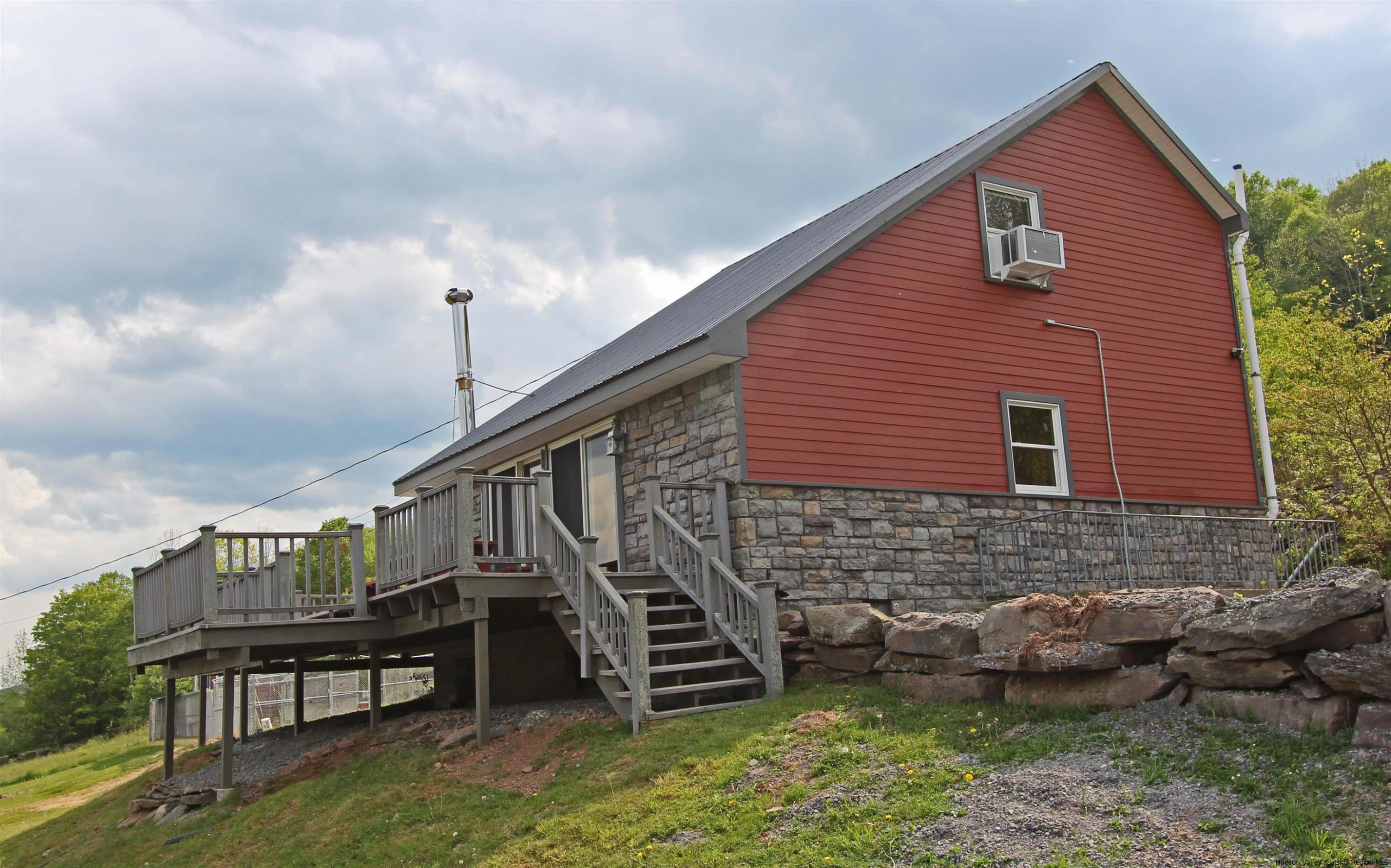 143 Rossman Road Roxbury, NY 12421 - Photo 3 of 35 a view of a house with a deck