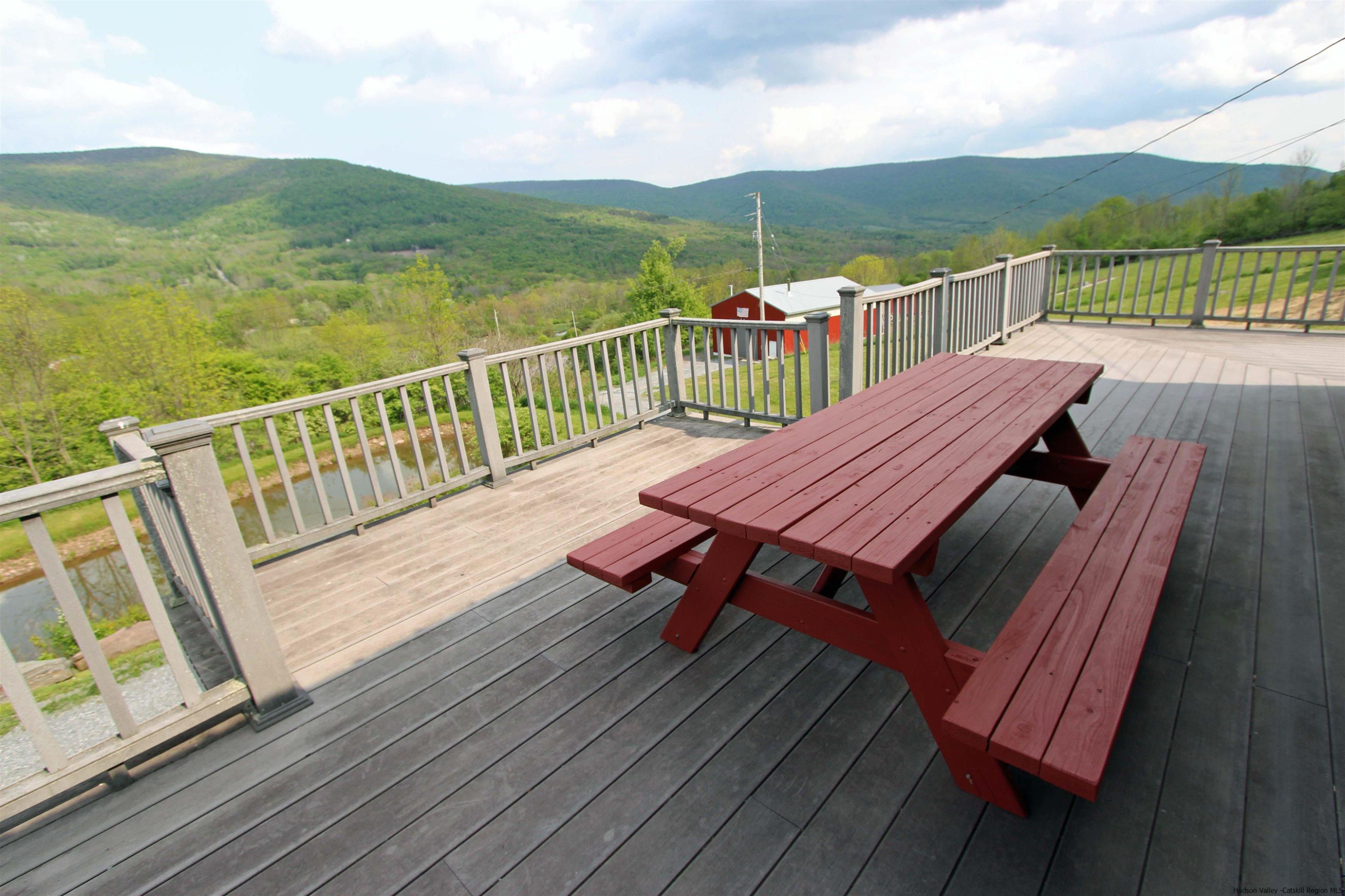 143 Rossman Road Roxbury, NY 12421 - Photo 5 of 35 a view of deck with mountain view and wooden floor
